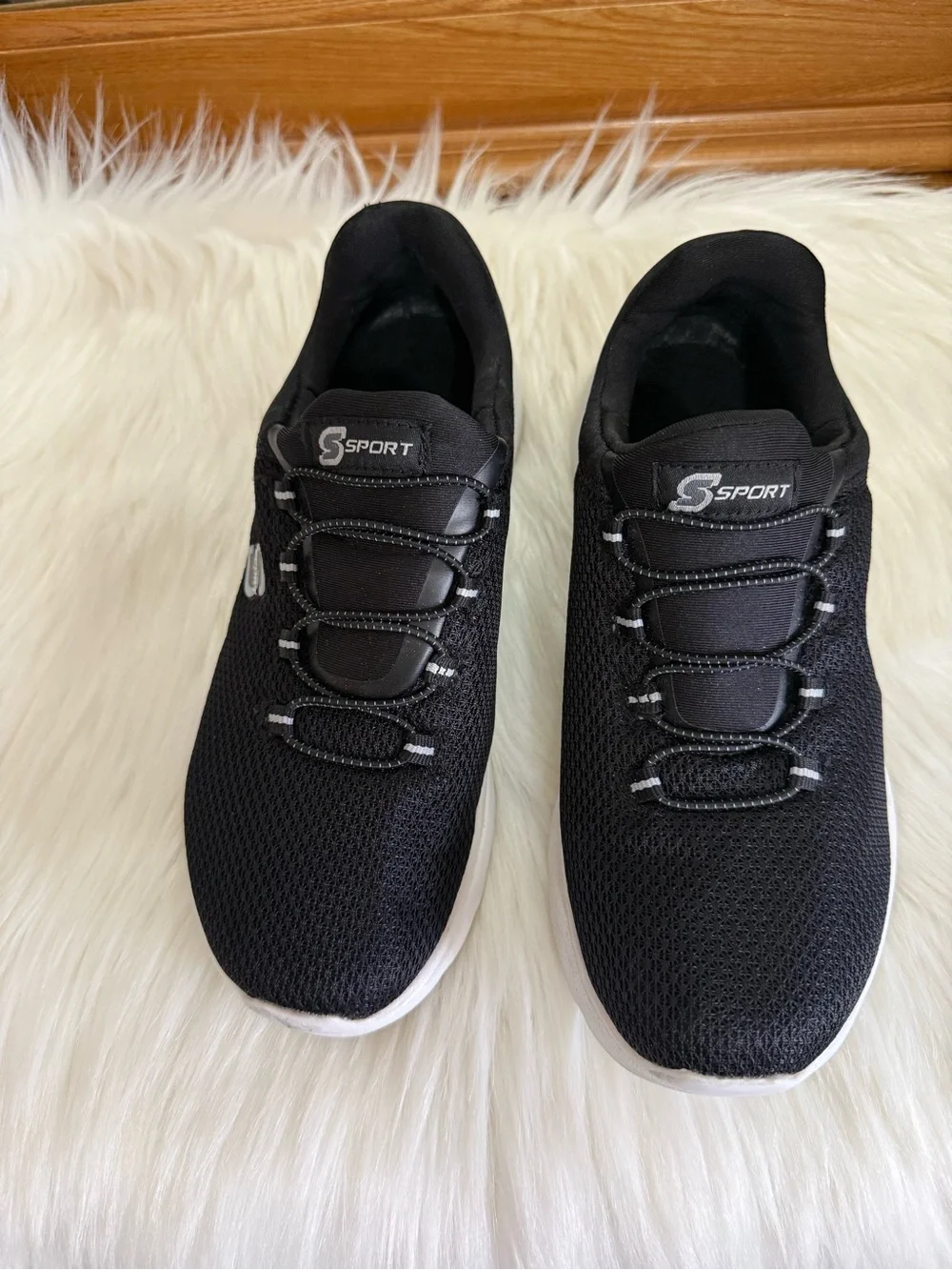 Skechers Women's Black Knit Slip-On Athletic Sneakers with White Sole